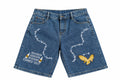 Short en jean bleu avec broderies blanches barbelé et patch aigle doré