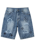 Short en jean bleu clair avec patchs effrangés et croix gothiques