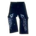 Jean baggy noir avec imprimé graffiti blanc sur les jambes